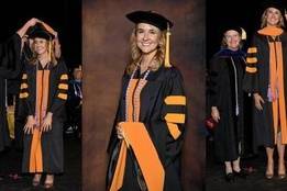 Nurse earning PhD and wearing robes